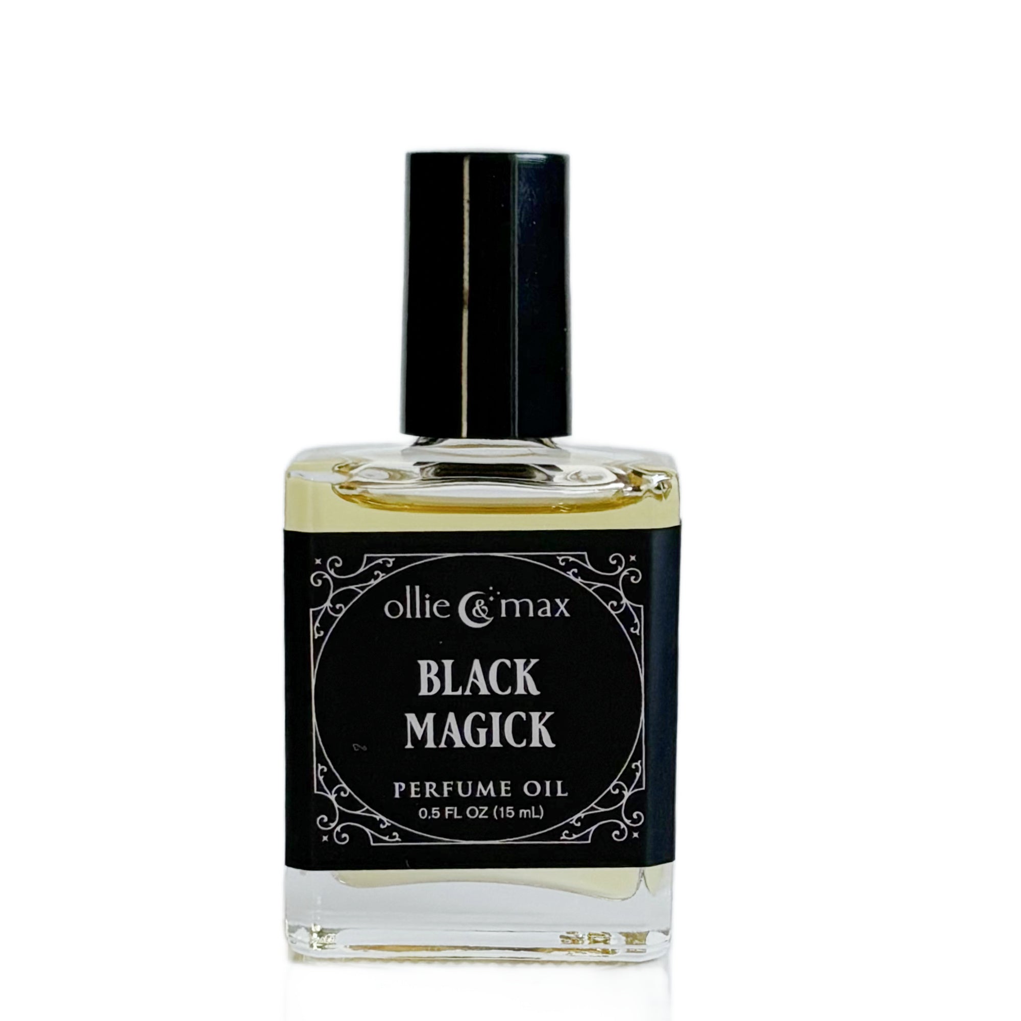 glass rectangle perfume bottle with a tall black cap. Black Magick vegan perfume oil 15ml. black label with silver lettering.
