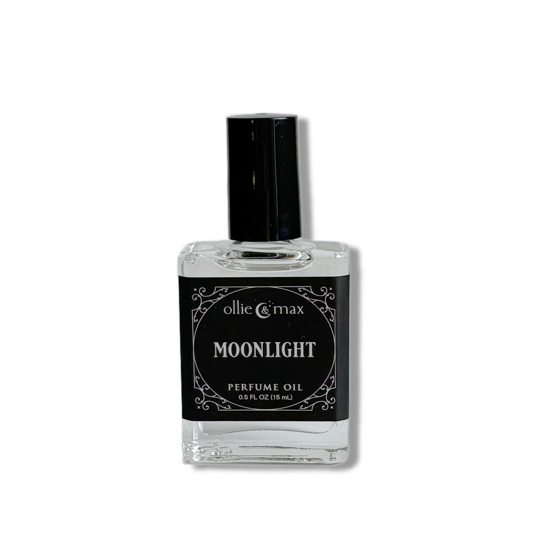 clear rectangular glass bottle with tall black cap. Black Label with silver lettering of Moonlight perfume oil, 15ml