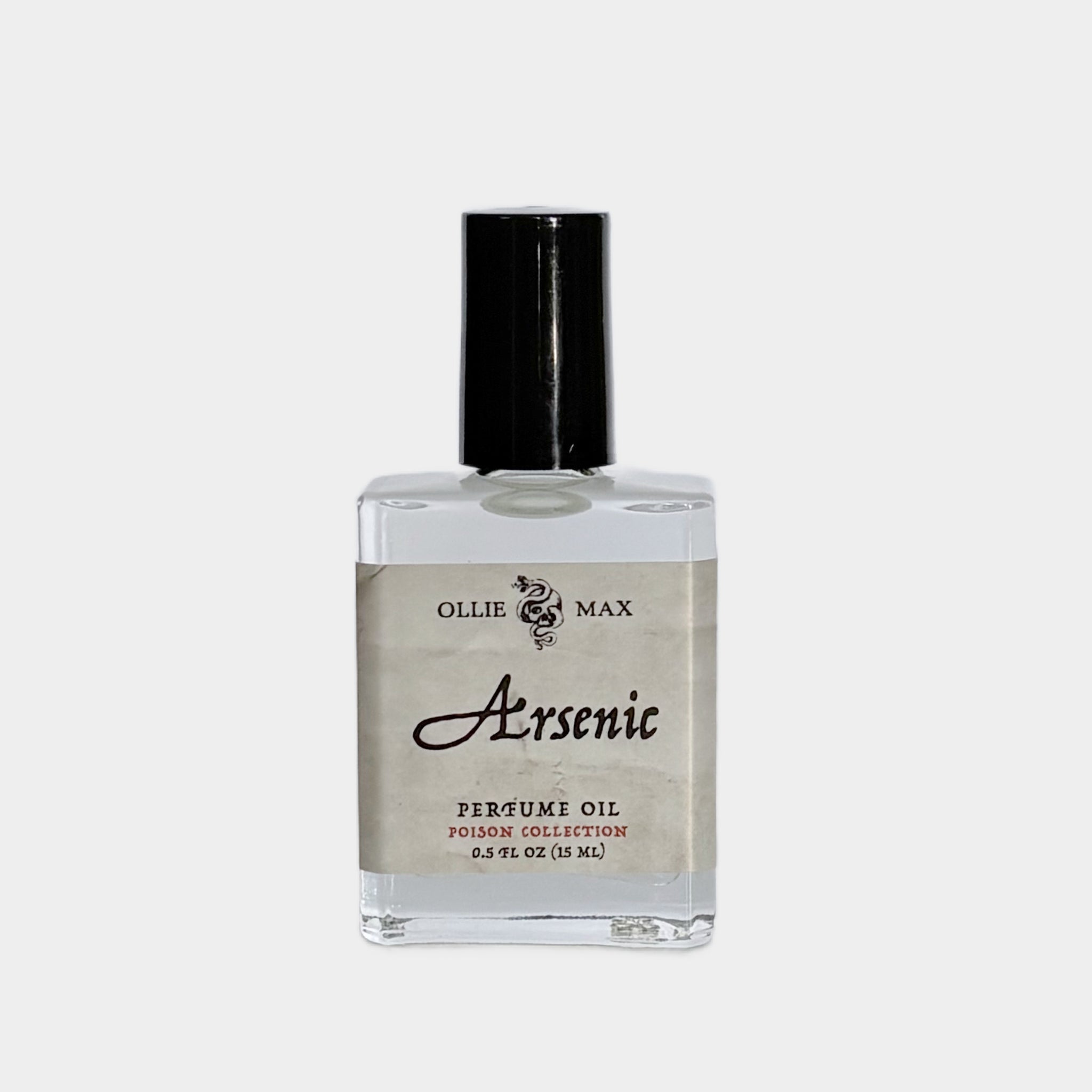 glass rectangle bottle of perfume with a tall black cap.  Label is designed to look like parchment paper with the name Arsenic. 15ml