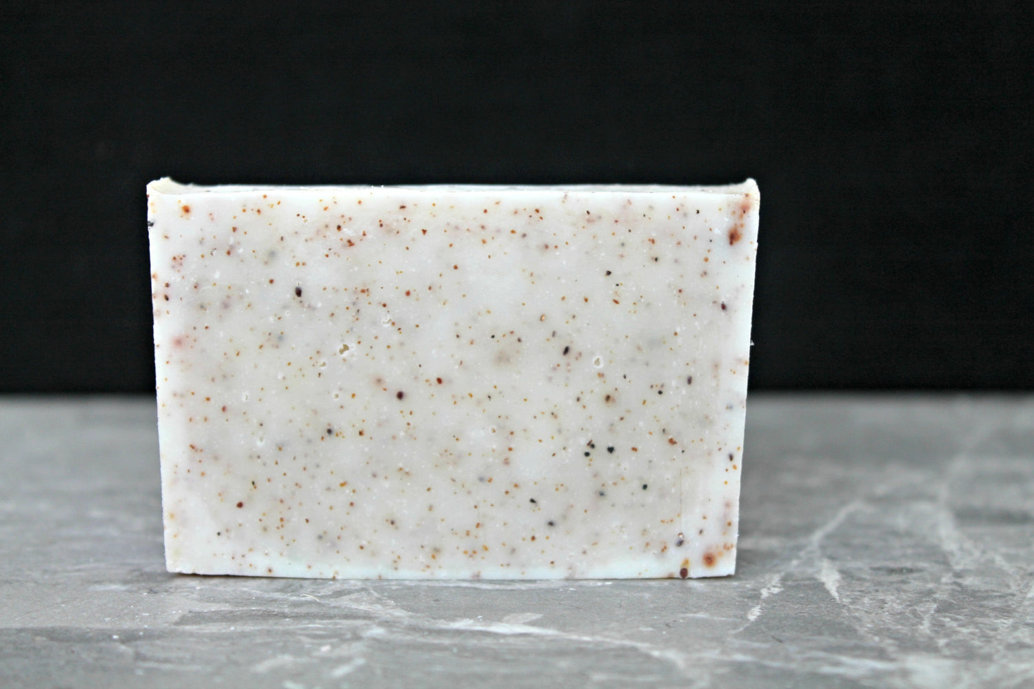 Nitty Gritty gardeners scrub soap with ground walnut, pumice and blueberry seeds. Cold process natural vegan soap.