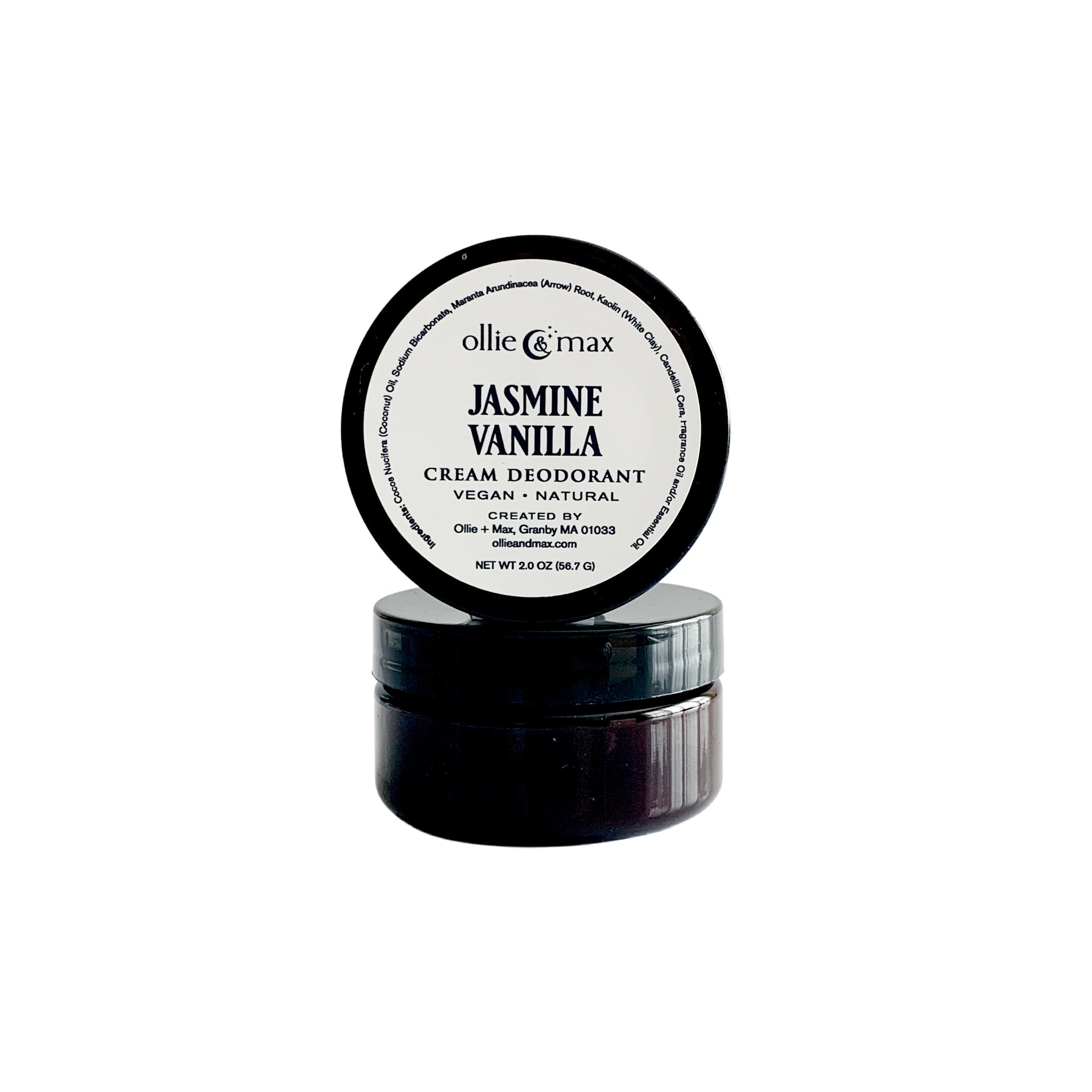 jasmine vanilla deodorant in a 2 oz round amber tub with a black lid