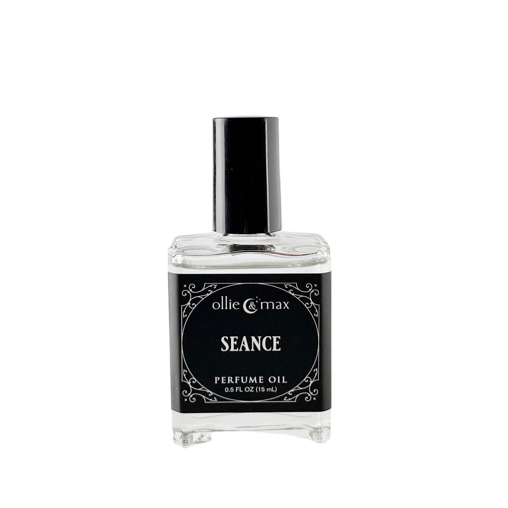 rectangle glass bottle with black cap and label, seance perfume oil, 15ml